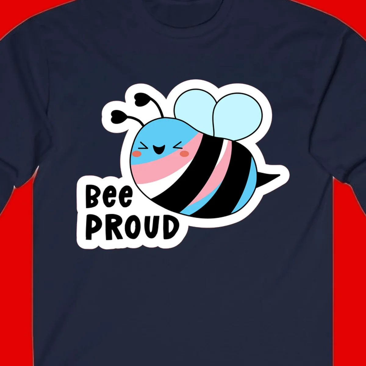 Smiling cartoon bee with blue head, pink mouth, striped body, and light blue wings next to 'Bee Proud' text