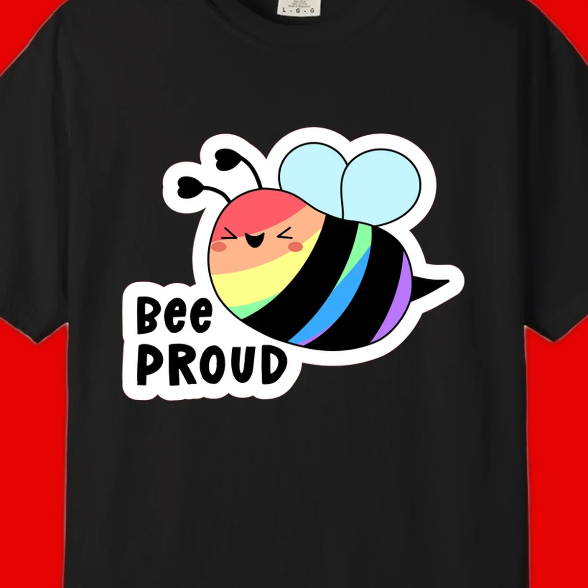 Cartoon bee with rainbow stripes and 'Bee PROUD' text celebrating LGBTQ+ pride