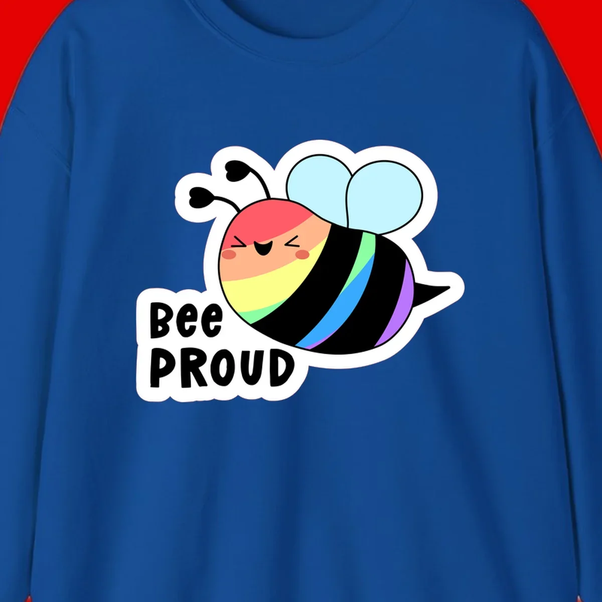 Cartoon bee with rainbow stripes and 'Bee PROUD' text celebrating LGBTQ+ pride