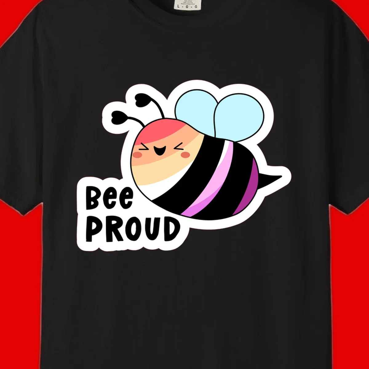 Cheerful cartoon bee with peach face and pink-striped body next to 'Bee Proud' text celebrating pride and individuality