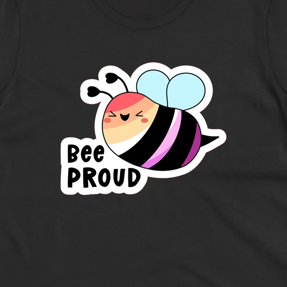 Cheerful cartoon bee with peach face and pink-striped body next to 'Bee Proud' text celebrating pride and individuality