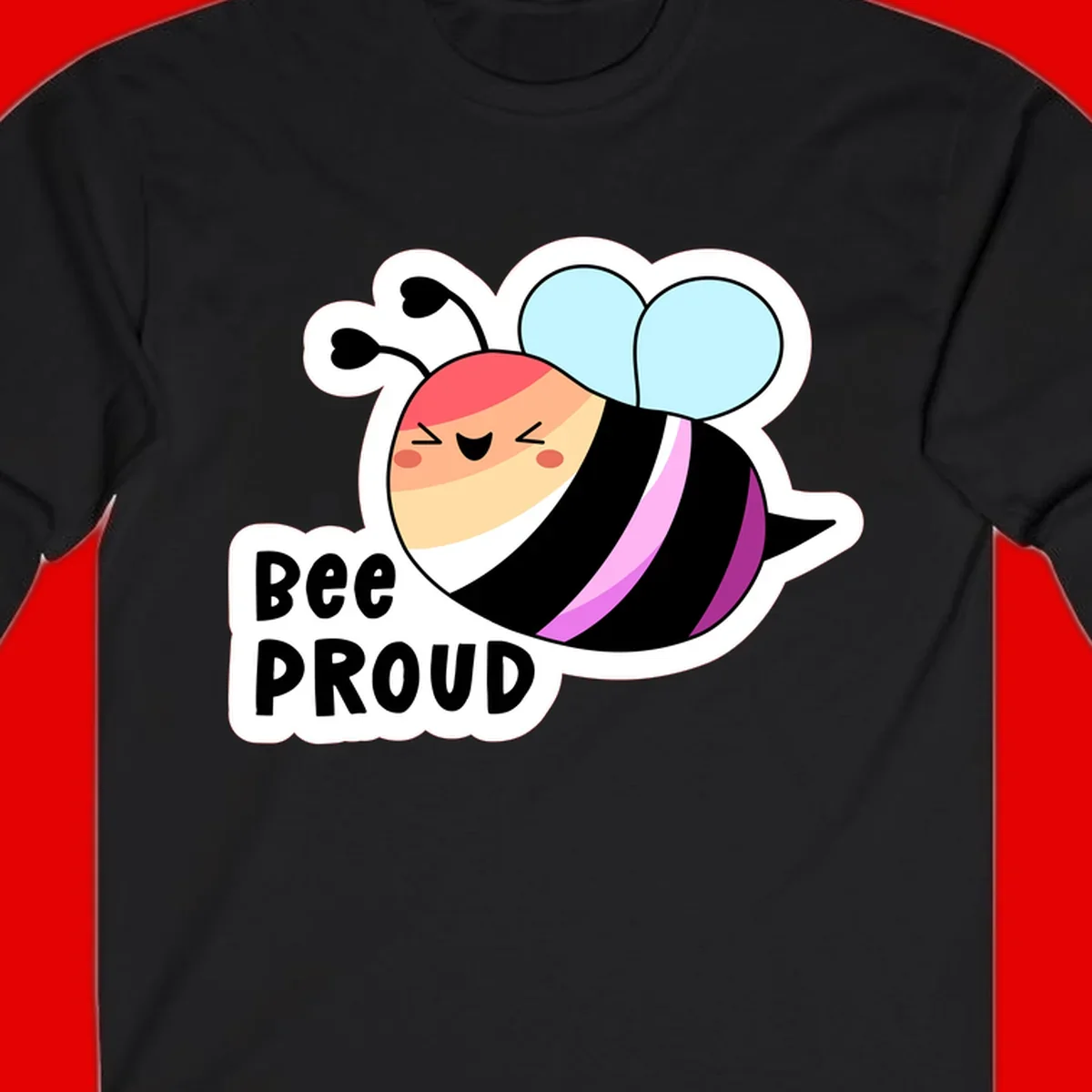 Cheerful cartoon bee with peach face and pink-striped body next to 'Bee Proud' text celebrating pride and individuality