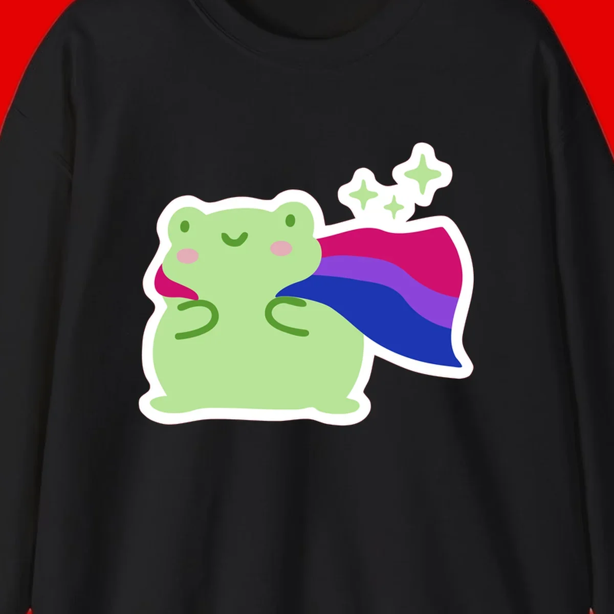 Smiling green frog wearing a flowing rainbow cape with floating sparkles, pride-frog-cape design illustration