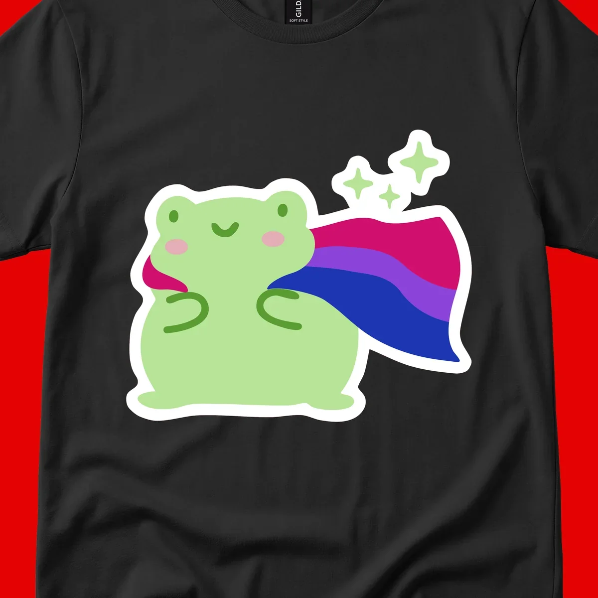 Smiling green frog wearing a flowing rainbow cape with floating sparkles, pride-frog-cape design illustration