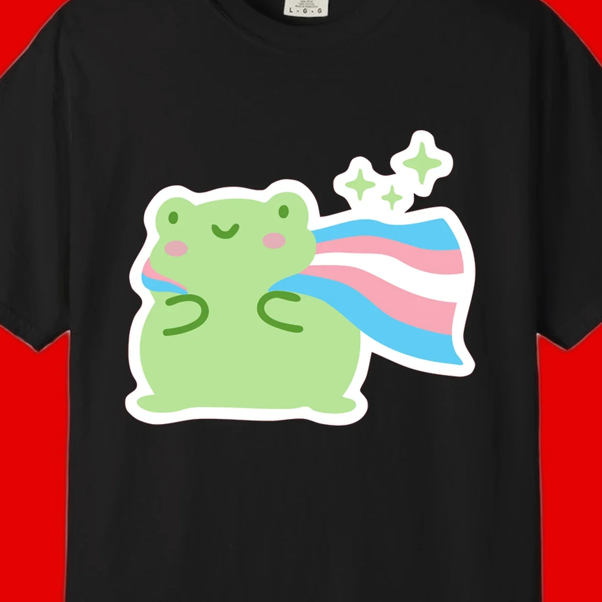 Cheerful green frog with sparkles wearing a magical pink and blue striped cape