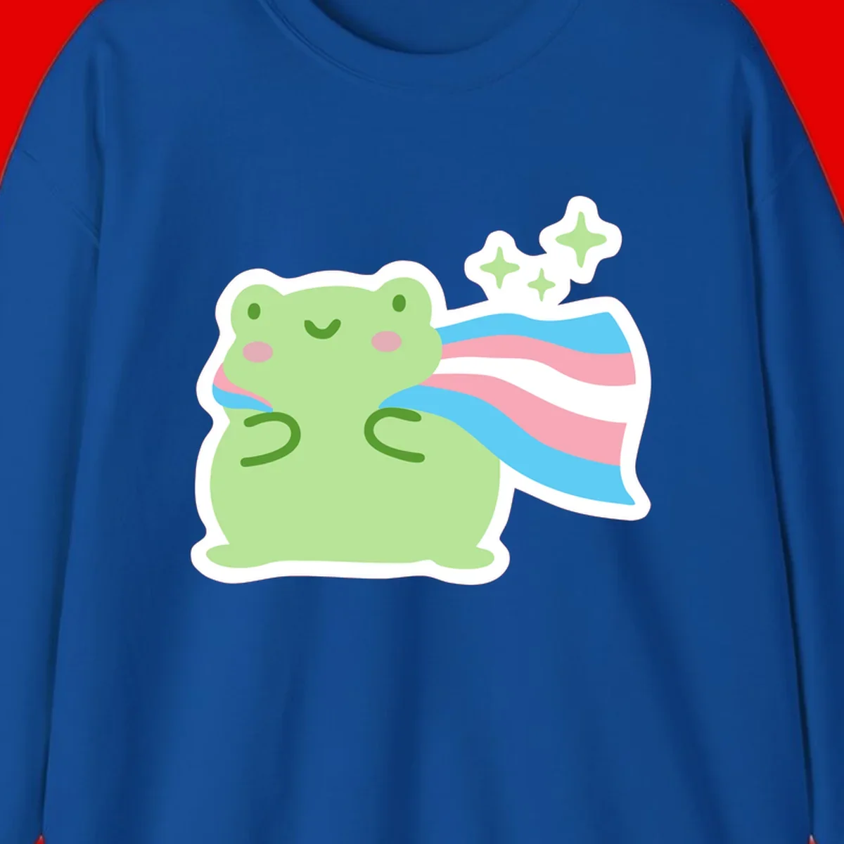 Cheerful green frog with sparkles wearing a magical pink and blue striped cape