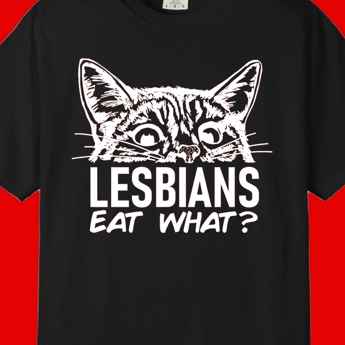 Lesbians eat what cat design: Detailed line-art cat face with expressive eyes and whiskers above bold text reading 'LESBIANS EAT WHAT?'