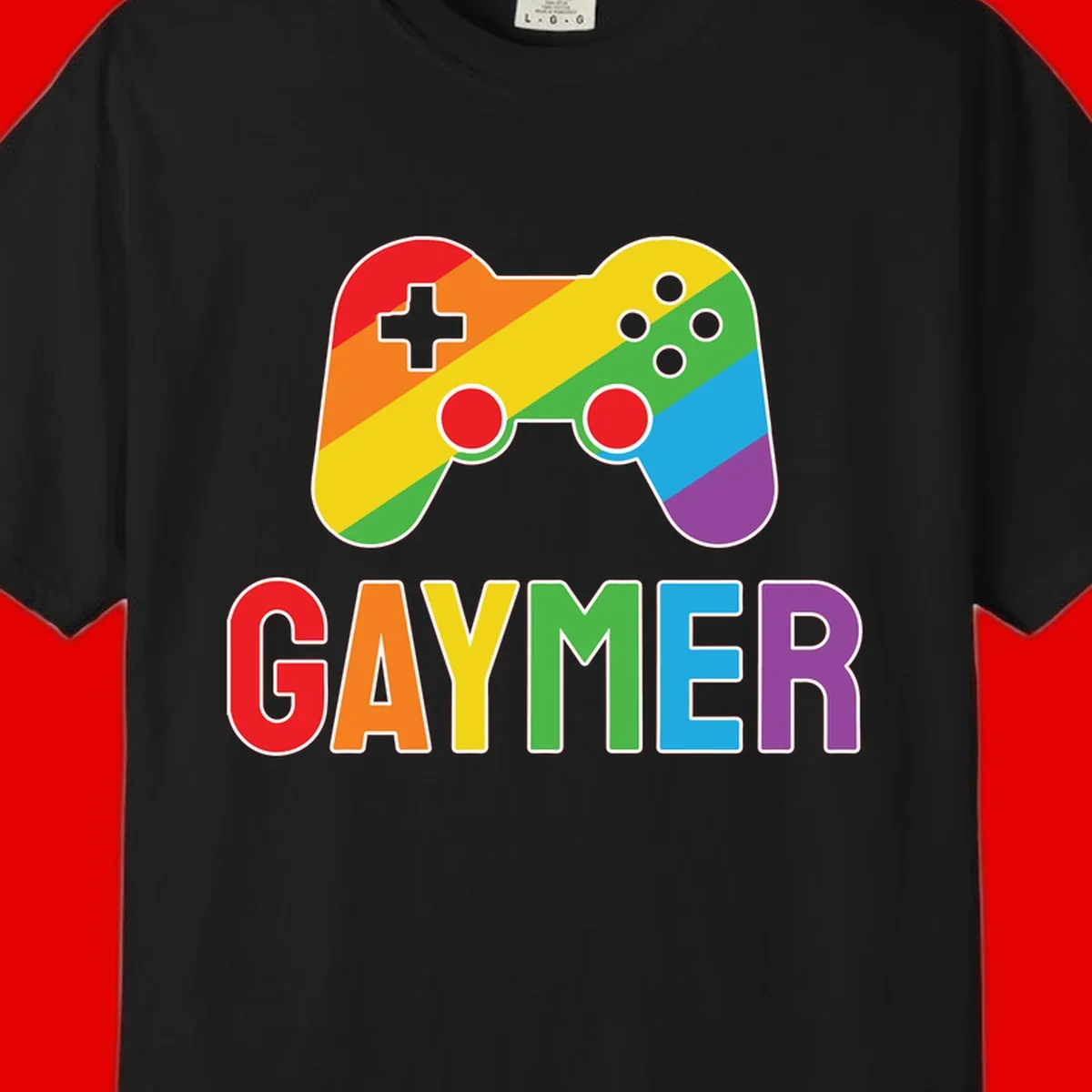 Rainbow gradient game controller with multicolored GAMER text below, featuring pride colors in diagonal stripes