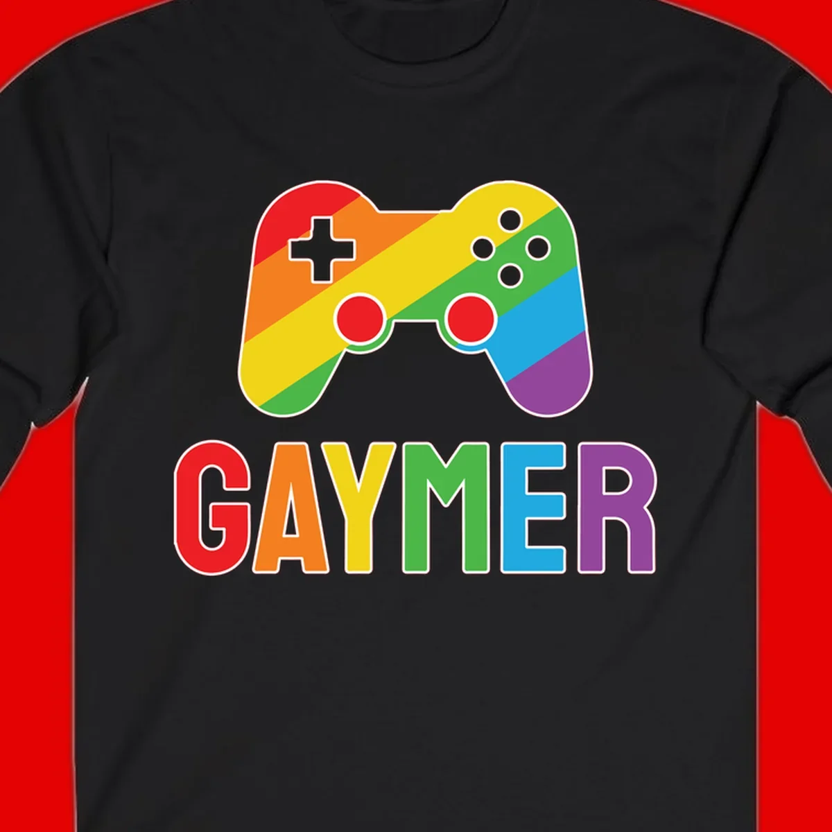 Rainbow gradient game controller with multicolored GAMER text below, featuring pride colors in diagonal stripes