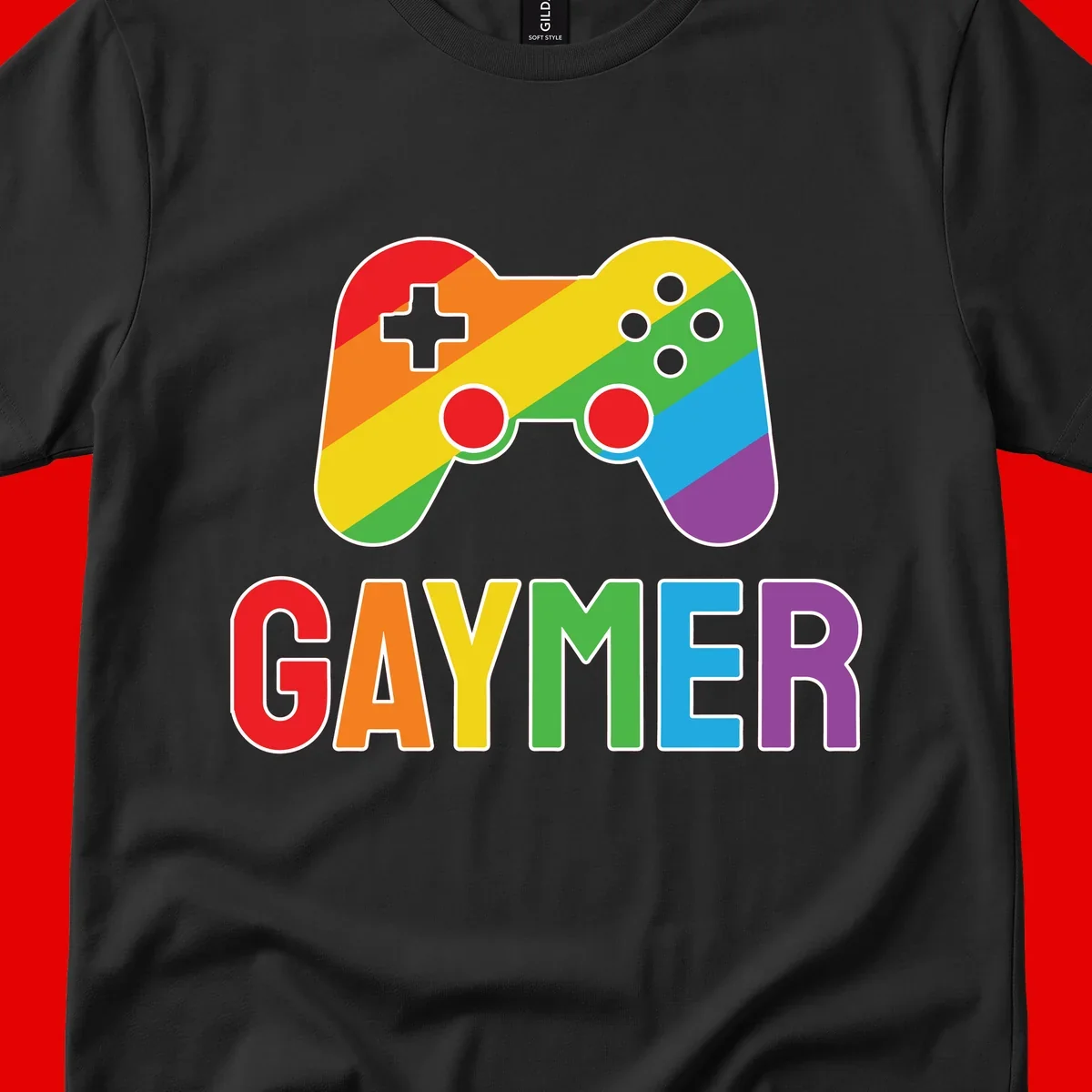Rainbow gradient game controller with multicolored GAMER text below, featuring pride colors in diagonal stripes