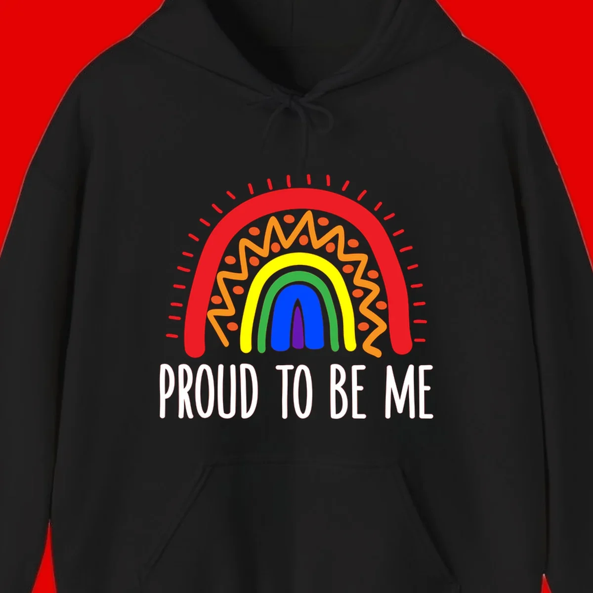 Colorful concentric rainbow arcs with radiating lines and zigzag patterns surrounding text that reads 'Proud To Be Me'