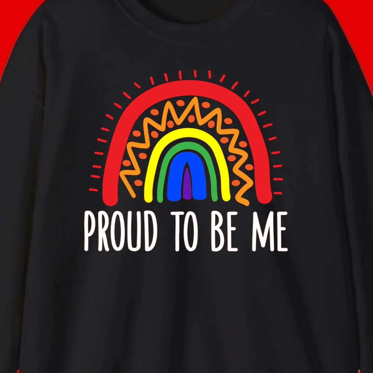 Colorful concentric rainbow arcs with radiating lines and zigzag patterns surrounding text that reads 'Proud To Be Me'
