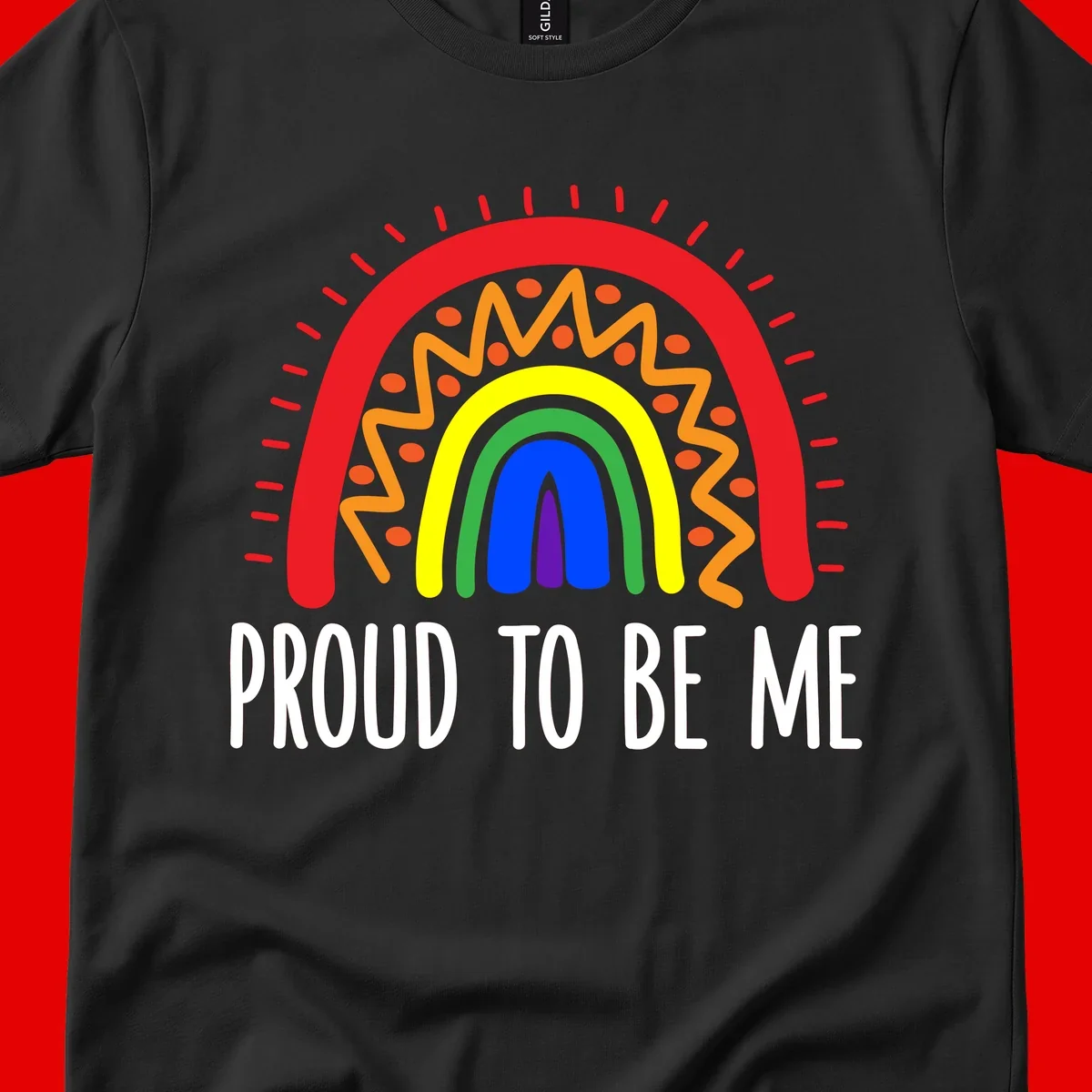 Colorful concentric rainbow arcs with radiating lines and zigzag patterns surrounding text that reads 'Proud To Be Me'