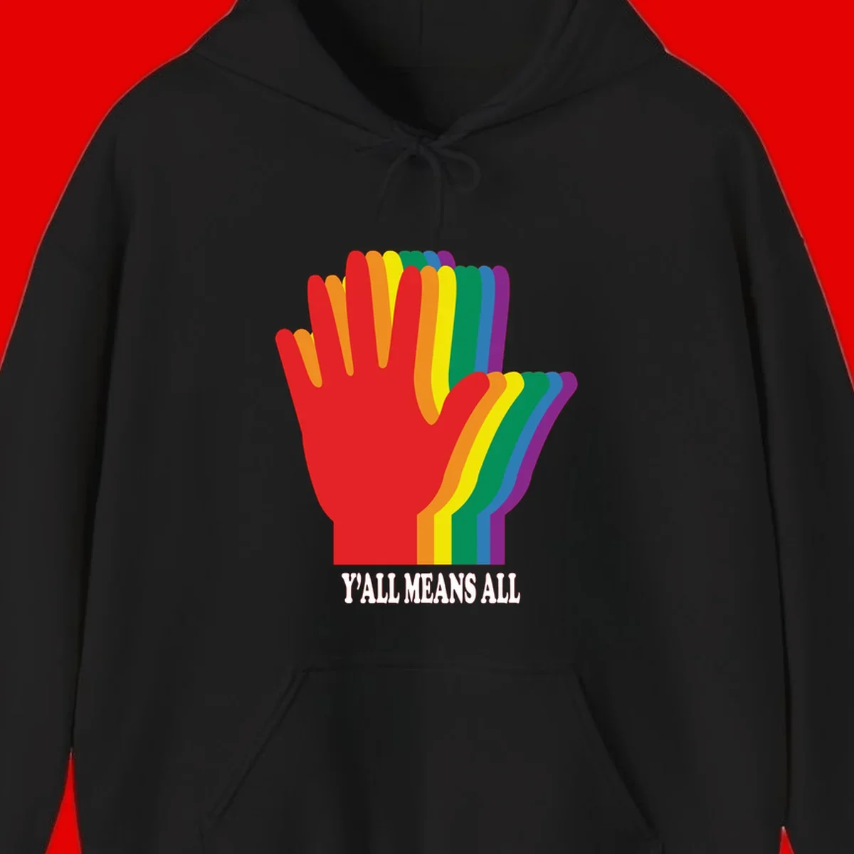 Rainbow-striped raised hand silhouette with 'Y'All Means All' text promoting inclusivity and pride