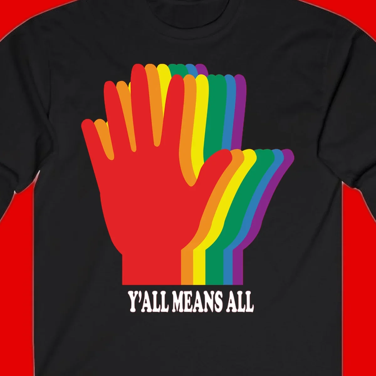 Rainbow-striped raised hand silhouette with 'Y'All Means All' text promoting inclusivity and pride