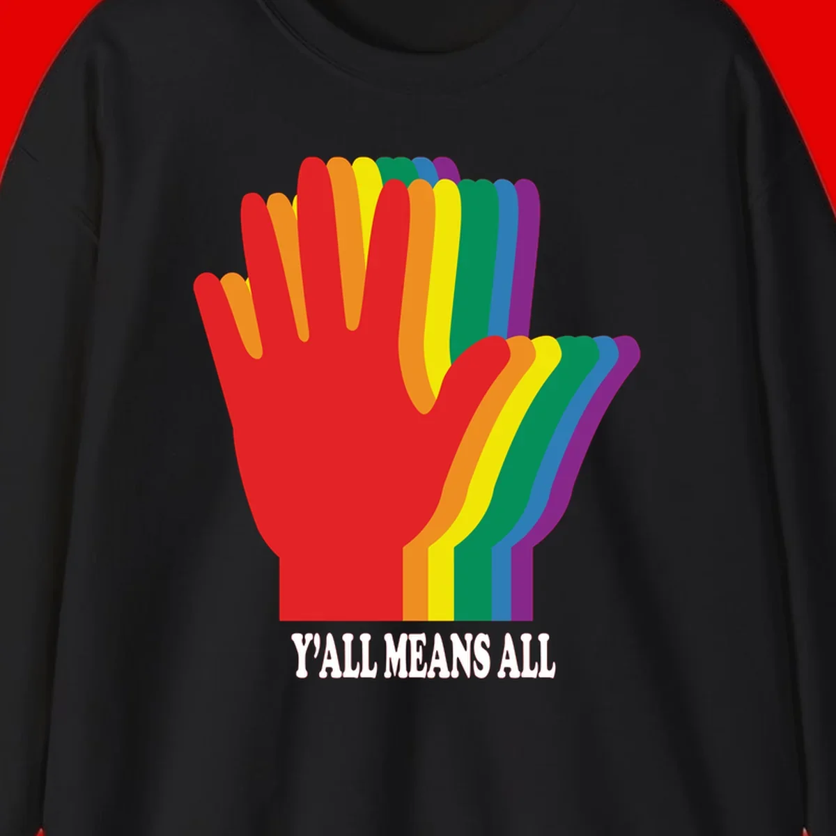 Rainbow-striped raised hand silhouette with 'Y'All Means All' text promoting inclusivity and pride