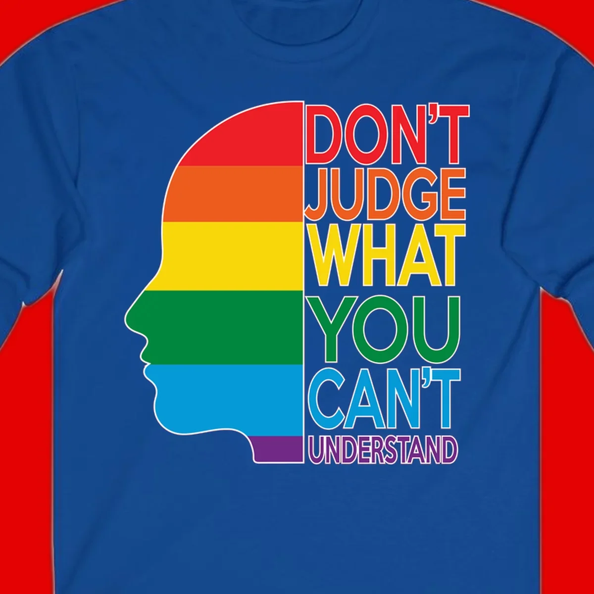 Rainbow-striped head silhouette with text 'Don't Judge What You Can't Understand' promoting LGBTQ acceptance and inclusion