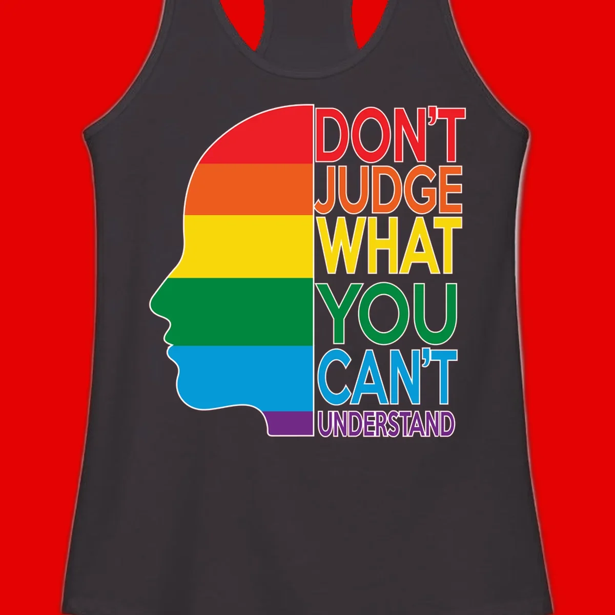 Rainbow-striped head silhouette with text 'Don't Judge What You Can't Understand' promoting LGBTQ acceptance and inclusion
