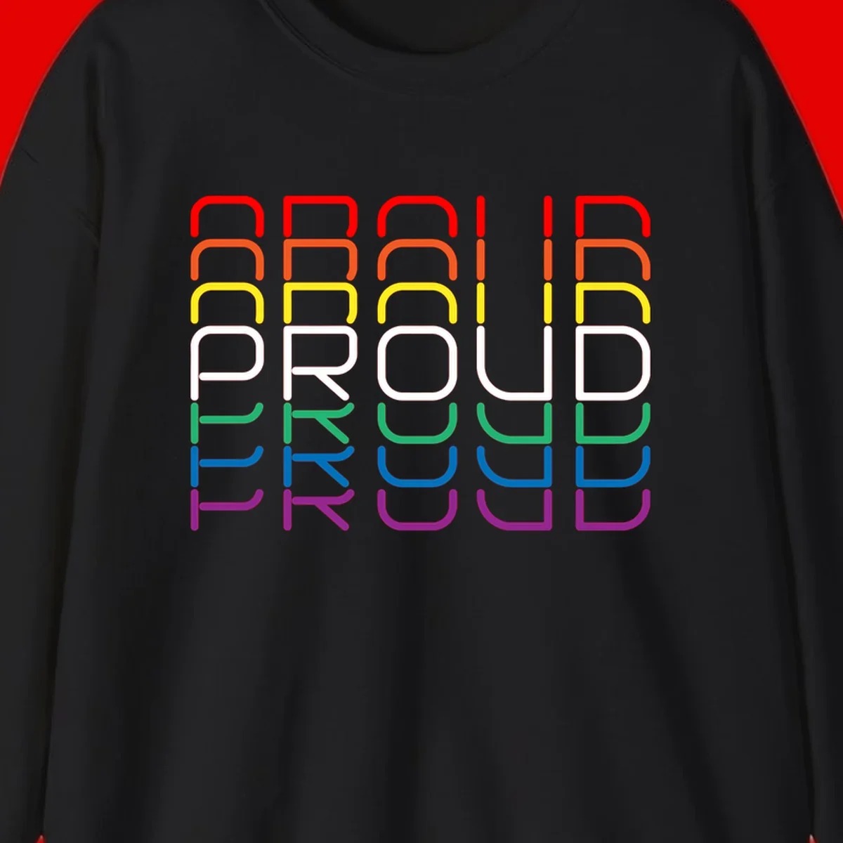 The word PROUD displayed in large rounded letters, each stacked layer colored in rainbow pride spectrum colors from red to purple