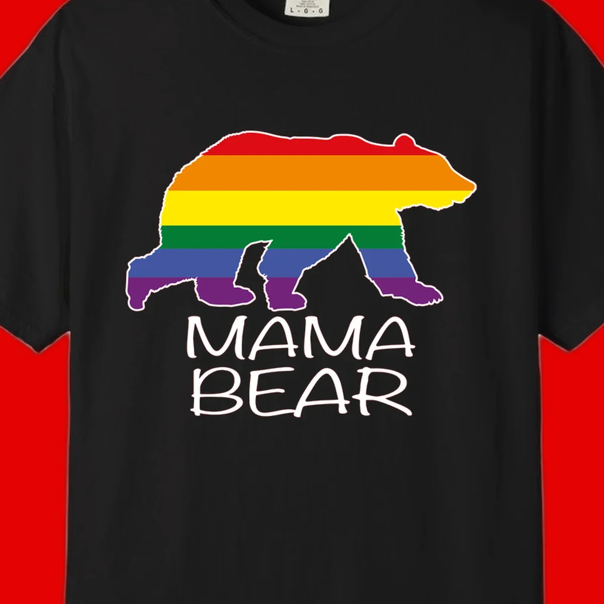Mama bear silhouette with rainbow pride stripes and mountain details, with 'MAMA BEAR' text below