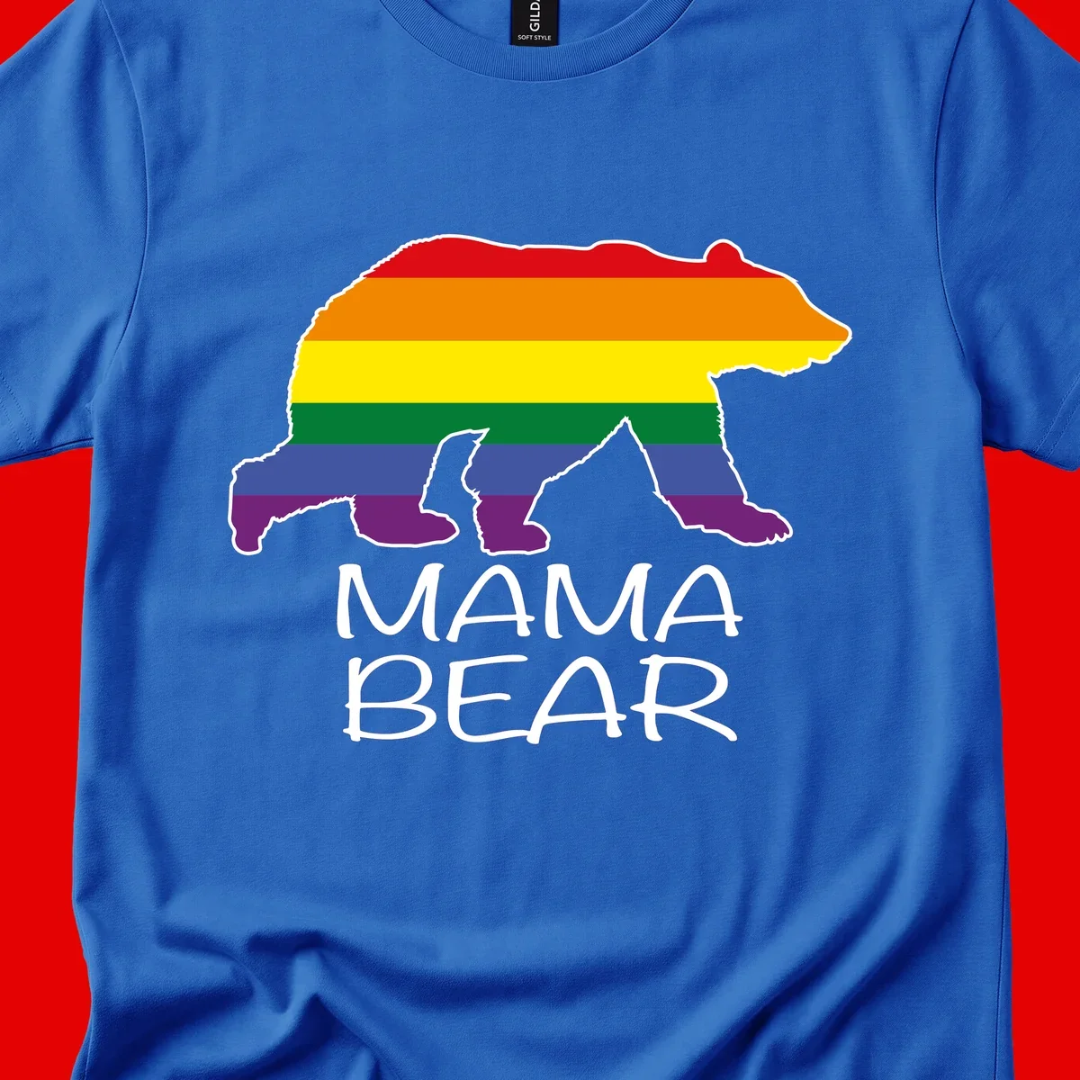 Mama bear silhouette with rainbow pride stripes and mountain details, with 'MAMA BEAR' text below