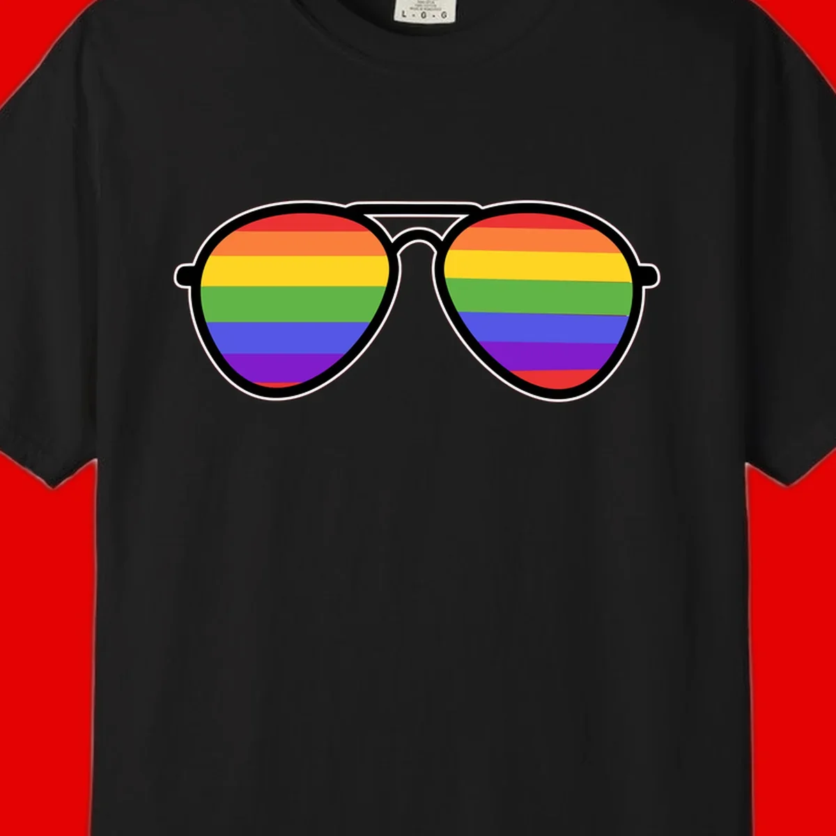 Pair of aviator sunglasses with rainbow-striped lenses in pride flag colors on gray background