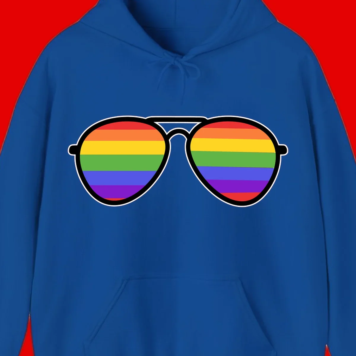 Pair of aviator sunglasses with rainbow-striped lenses in pride flag colors on gray background