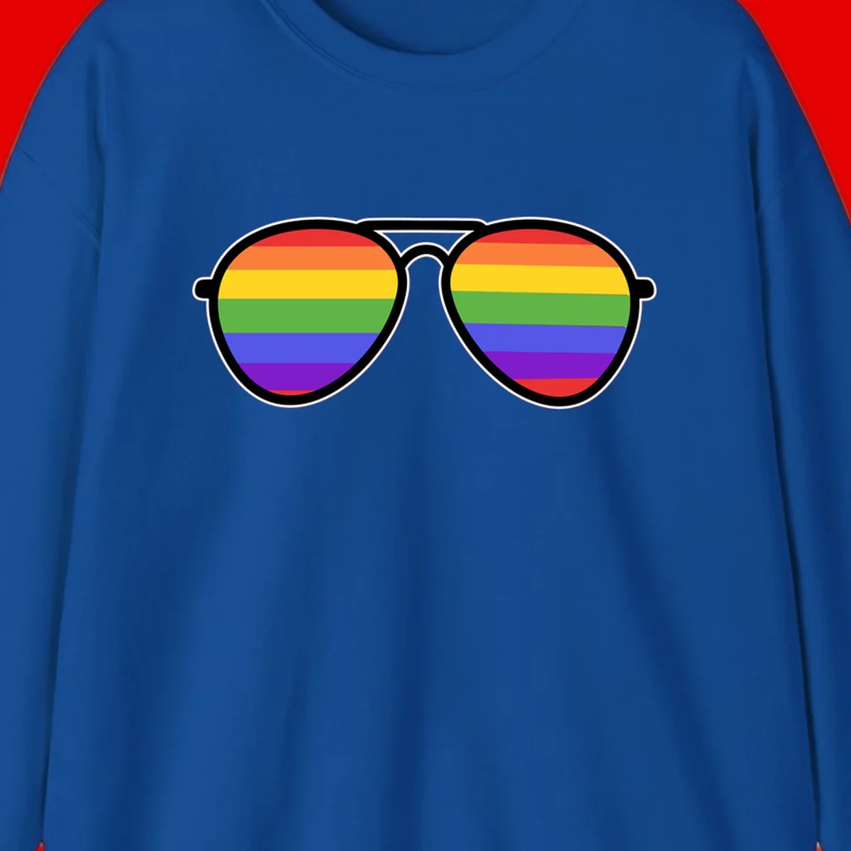 Pair of aviator sunglasses with rainbow-striped lenses in pride flag colors on gray background