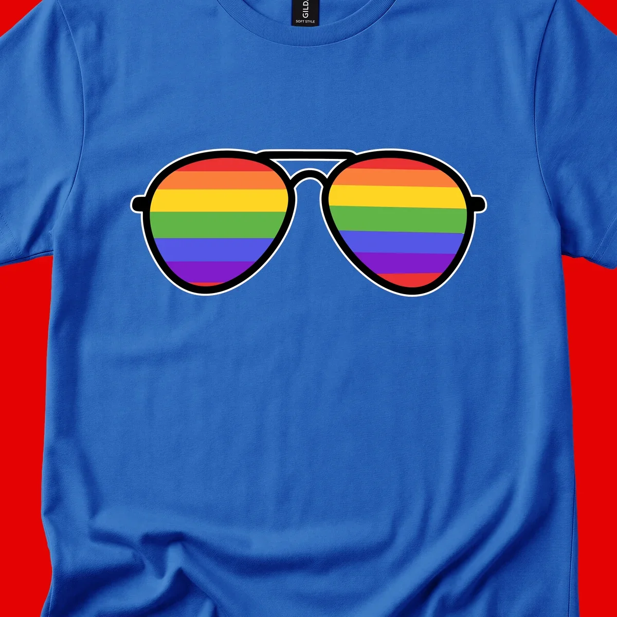 Pair of aviator sunglasses with rainbow-striped lenses in pride flag colors on gray background