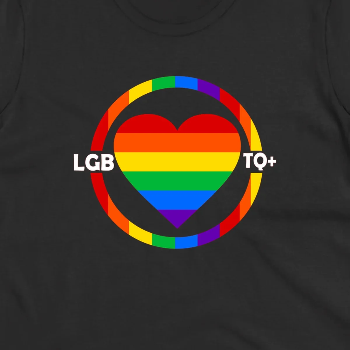 Rainbow heart with LGB TO+ text in concentric pride circles on gray background