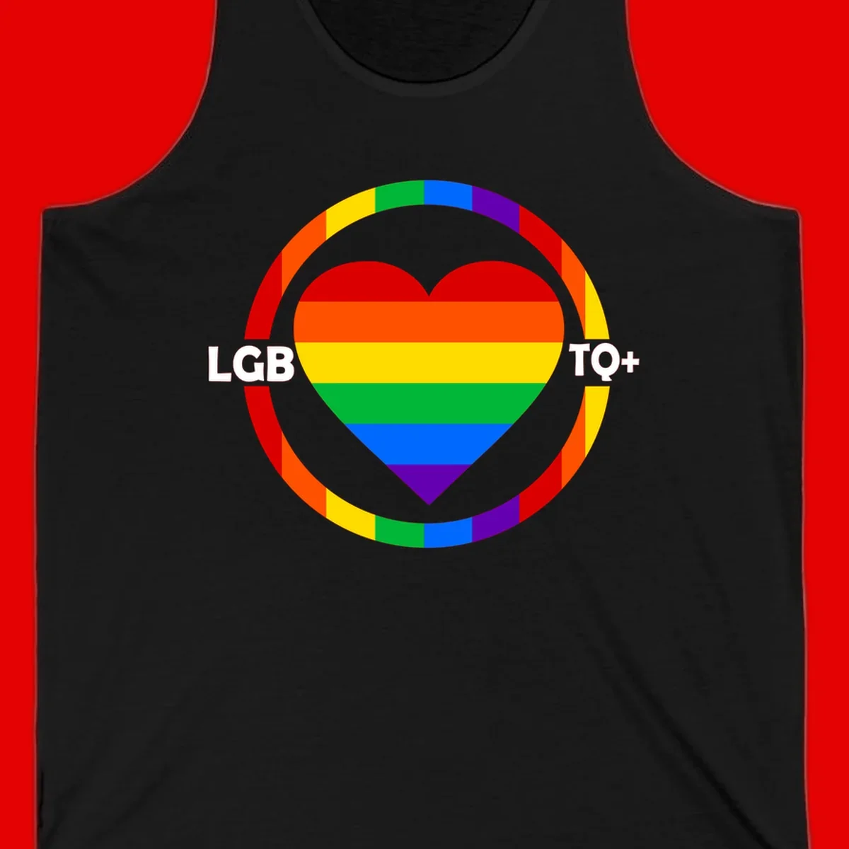 Rainbow heart with LGB TO+ text in concentric pride circles on gray background
