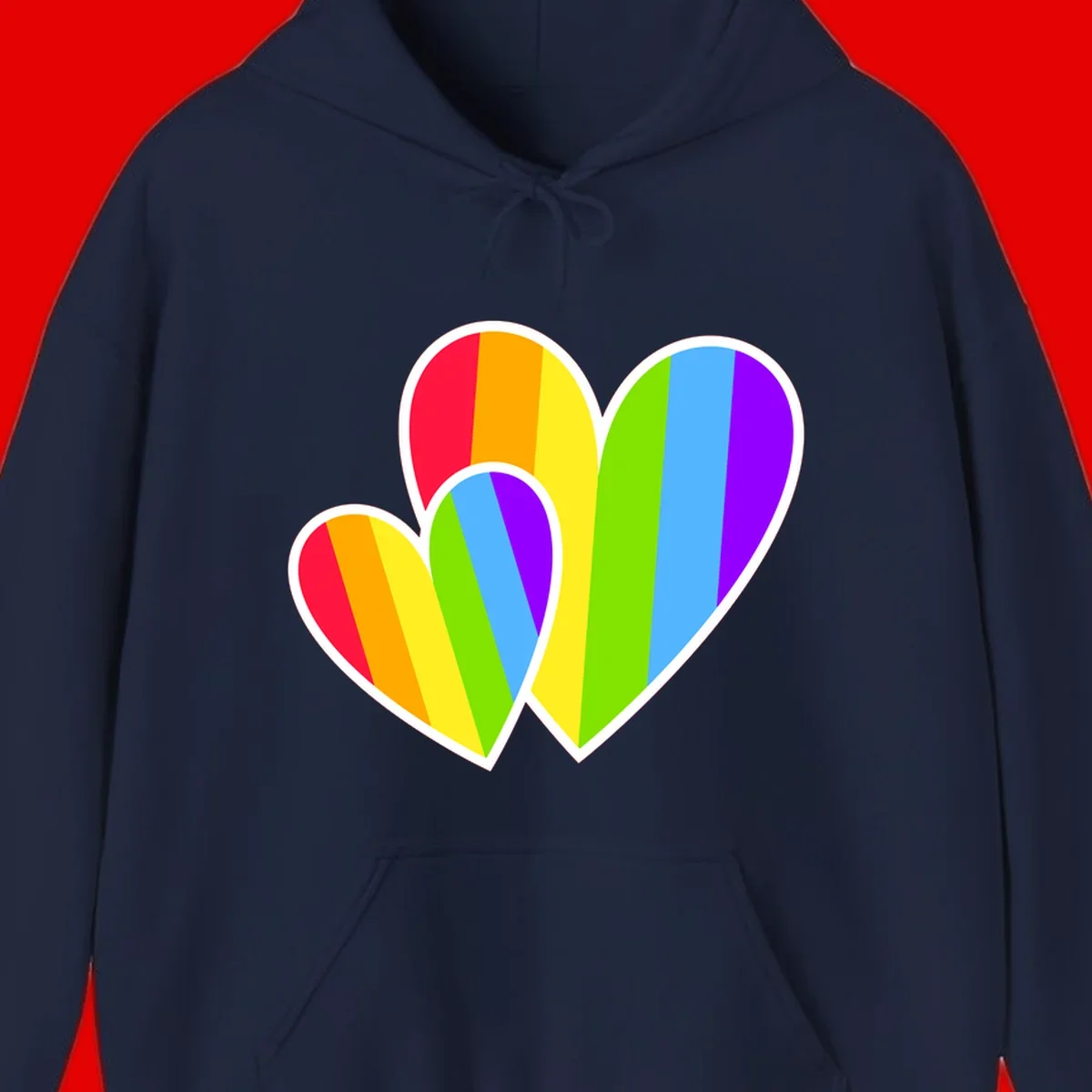 Three overlapping hearts with vertical rainbow stripes in pride colors: red, orange, yellow, green, blue, and purple with white borders