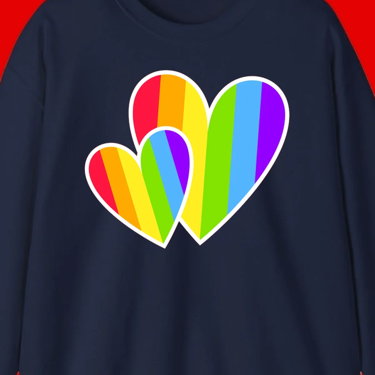 Three overlapping hearts with vertical rainbow stripes in pride colors: red, orange, yellow, green, blue, and purple with white borders