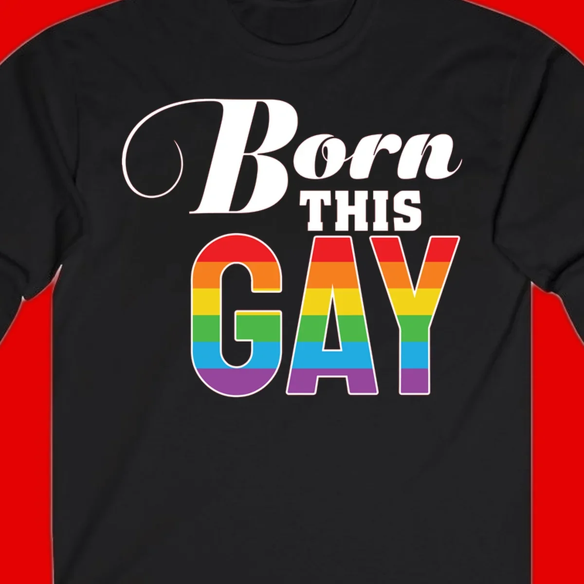 Born This Gay pride design with rainbow flag stripes filling large letters on gray background
