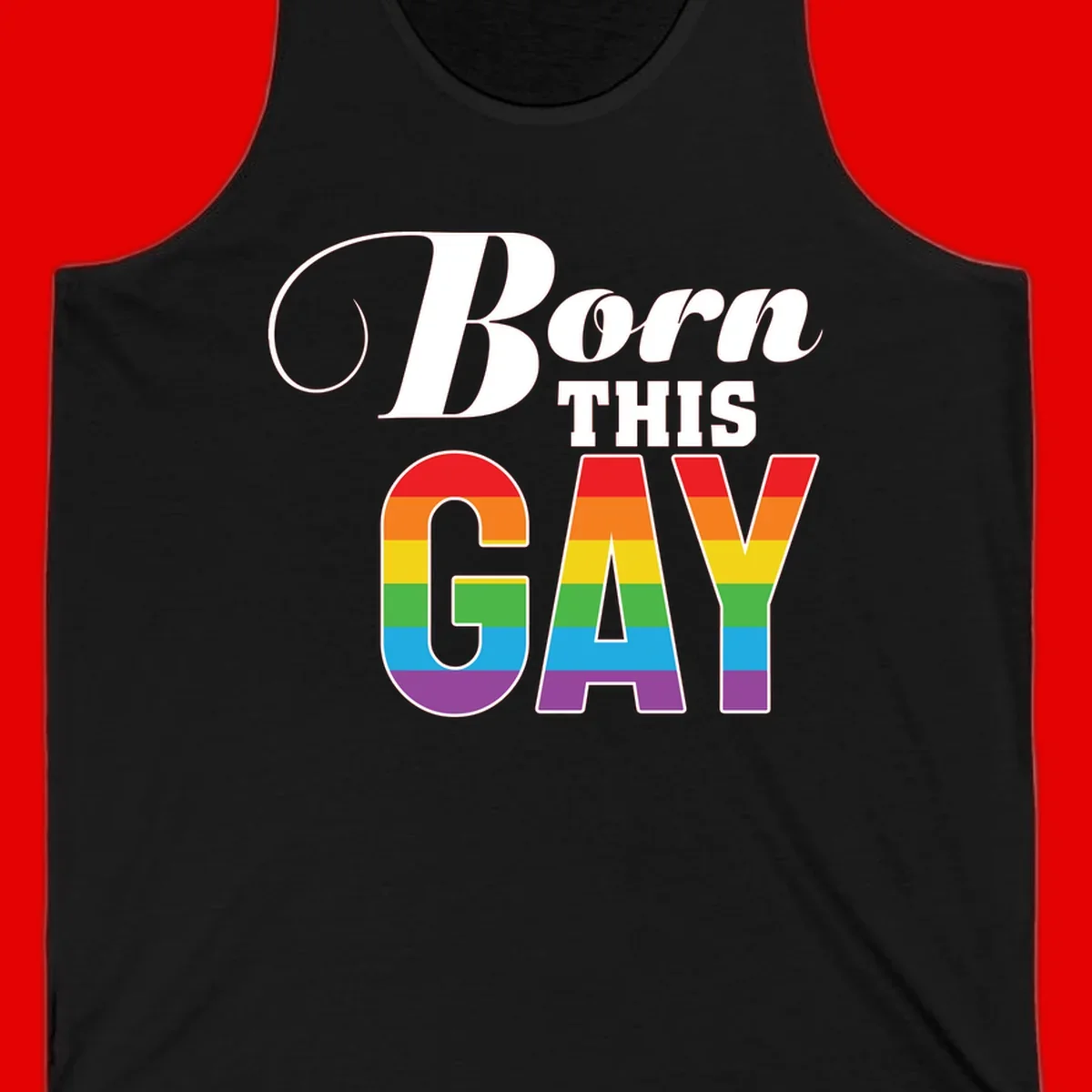 Born This Gay pride design with rainbow flag stripes filling large letters on gray background