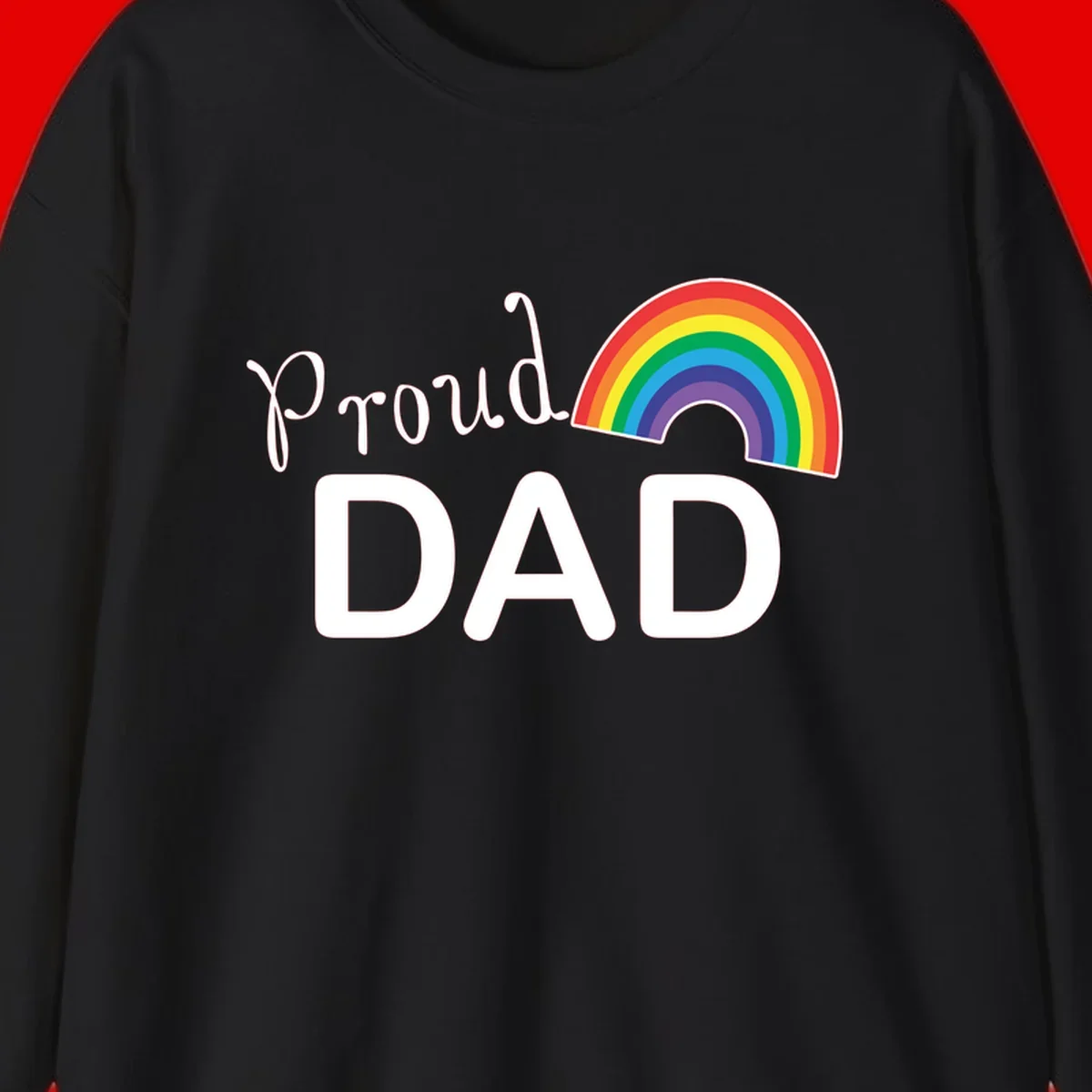 White text reading 'Proud DAD' with a colorful rainbow arc featuring red, orange, yellow, green, blue, and purple stripes on gray background