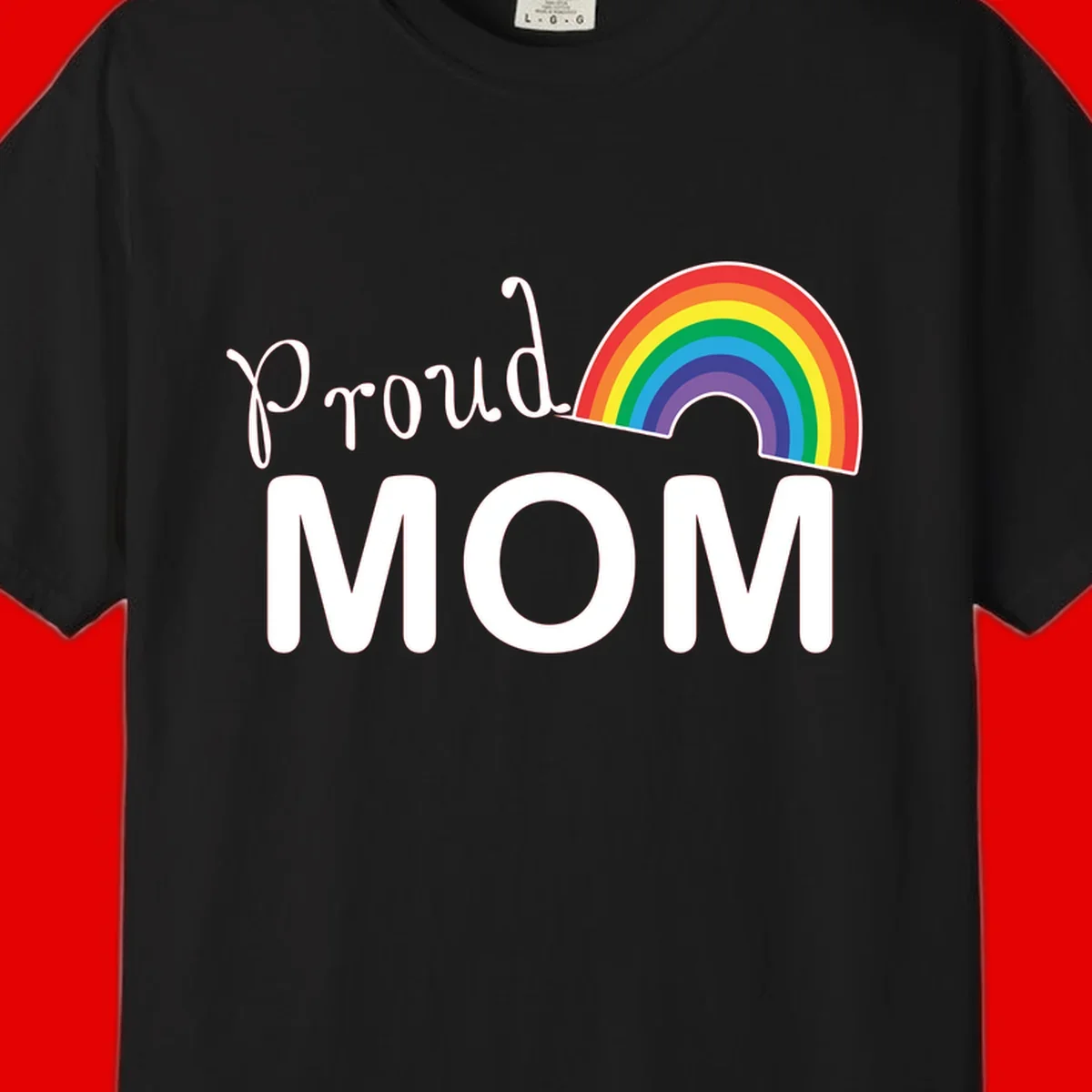 Proud Mom design with white text and vibrant rainbow arc on gray background