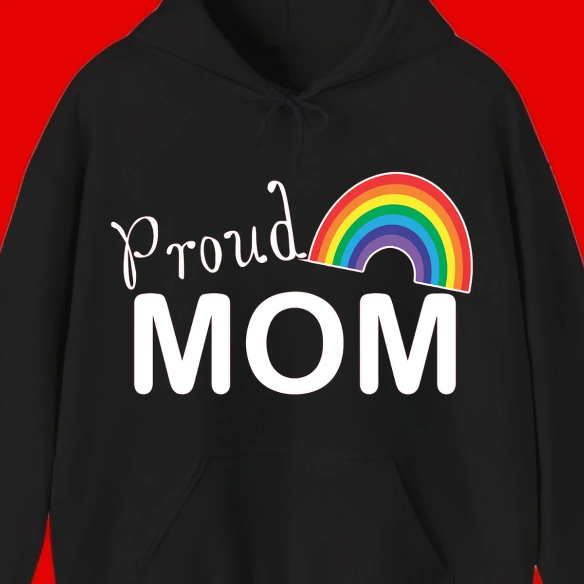Proud Mom design with white text and vibrant rainbow arc on gray background