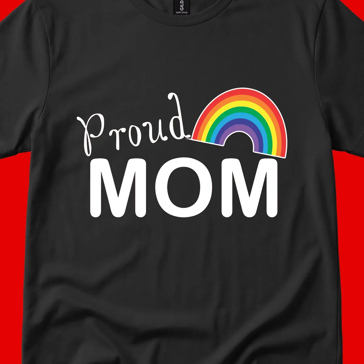 Proud Mom design with white text and vibrant rainbow arc on gray background