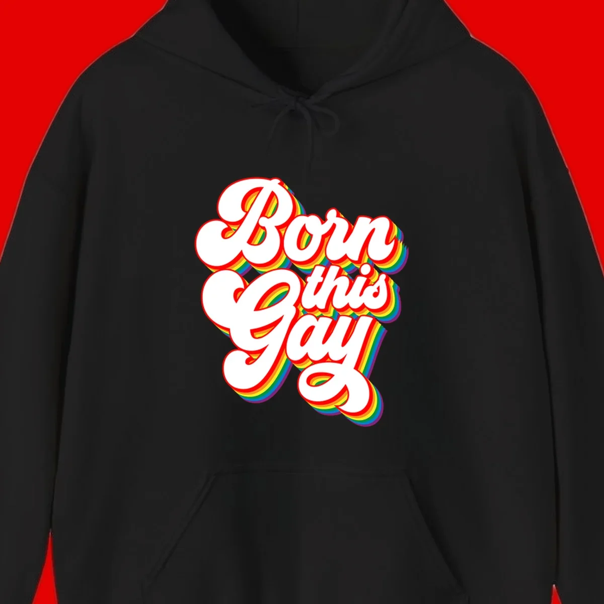 Born this gay pride design with white text outlined in red and filled with rainbow stripes on gray background