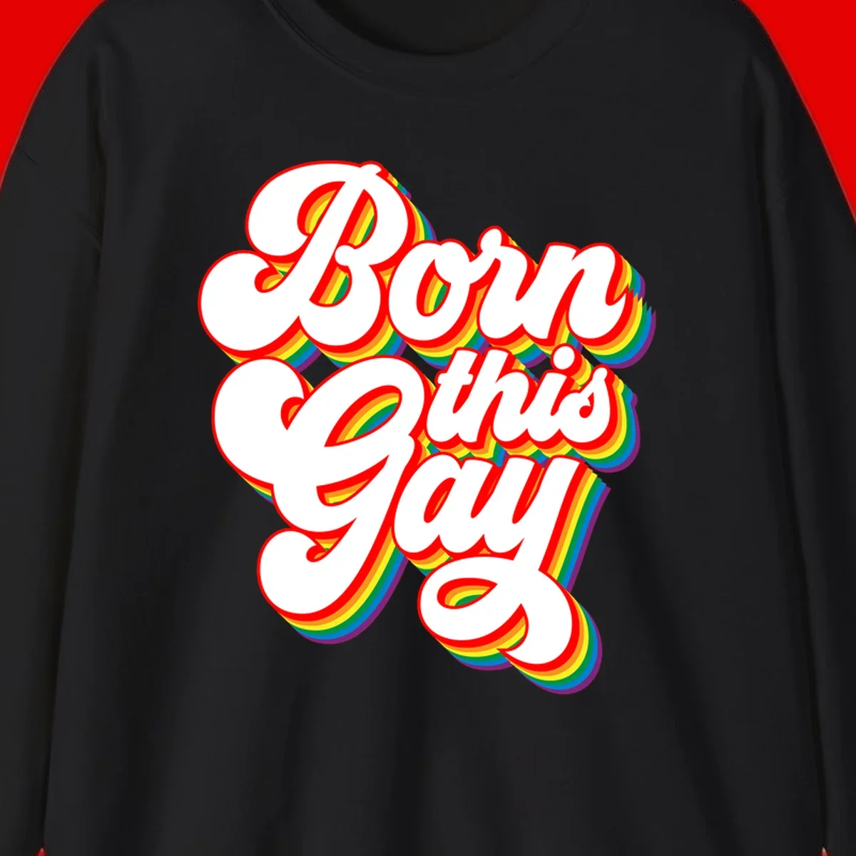 Born this gay pride design with white text outlined in red and filled with rainbow stripes on gray background