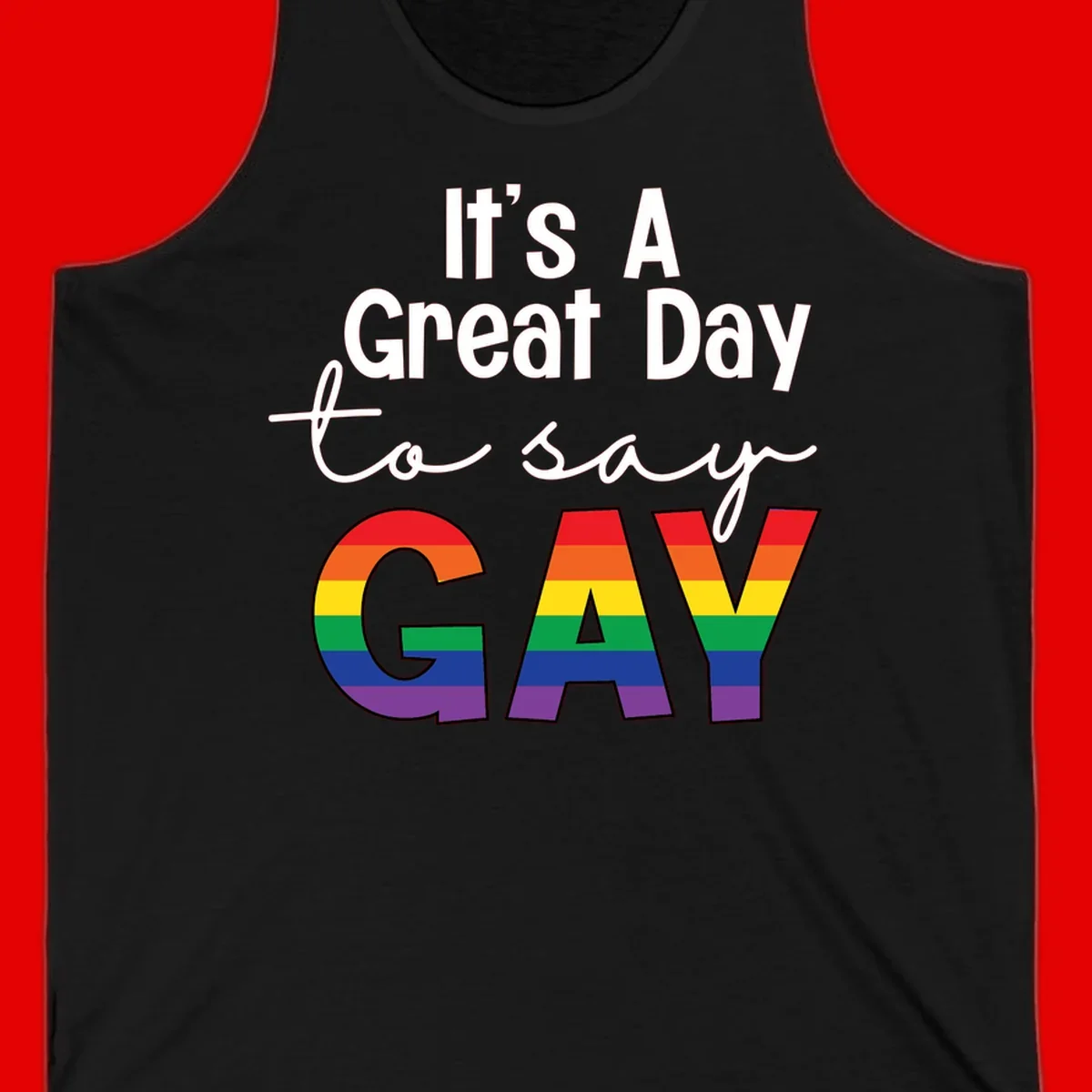 Gray background with white text reading 'It's A Great Day To Say' and the word 'GAY' in large letters filled with rainbow pride flag stripes