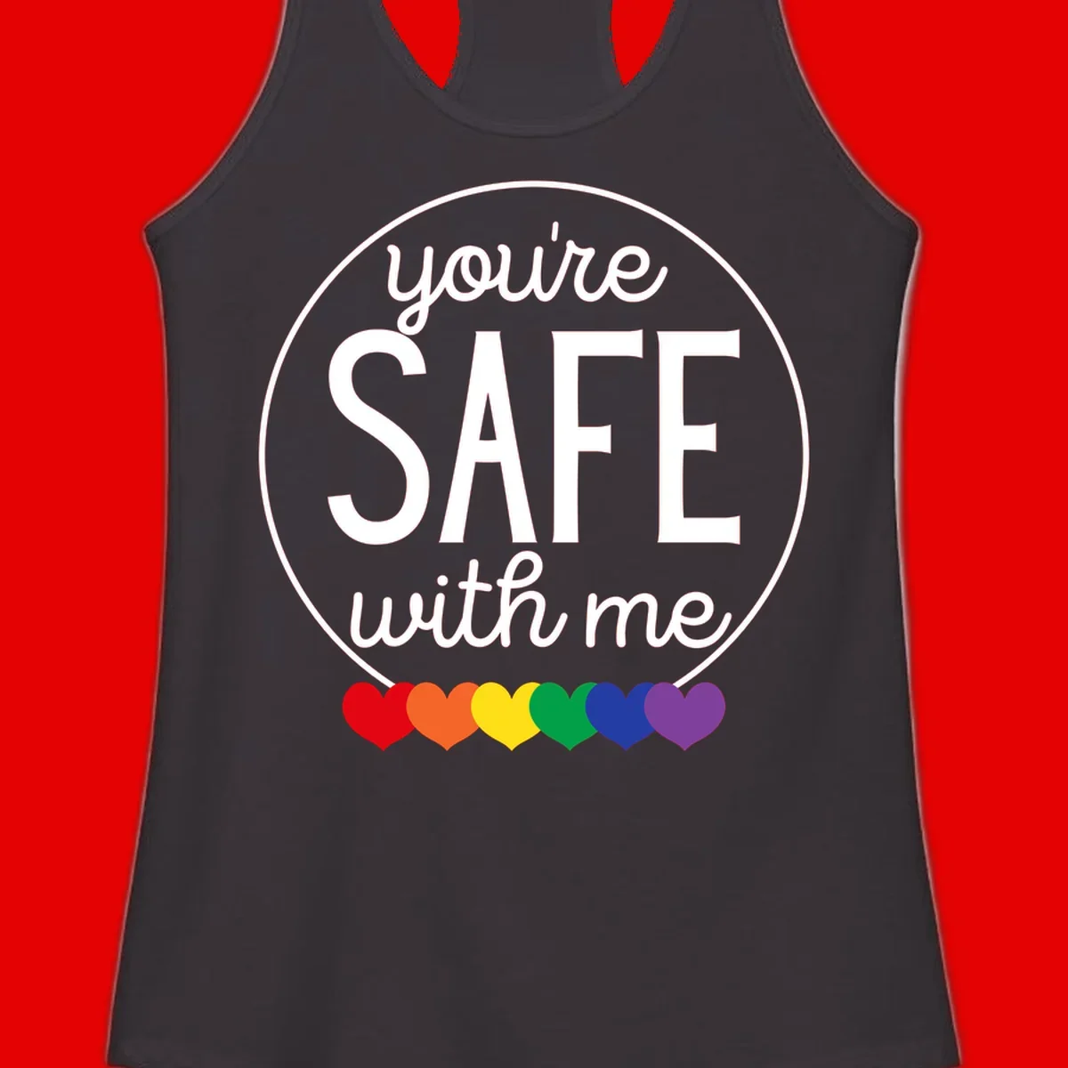 Circular badge with 'you're SAFE with me' text and rainbow pride hearts, promoting inclusive safe space message