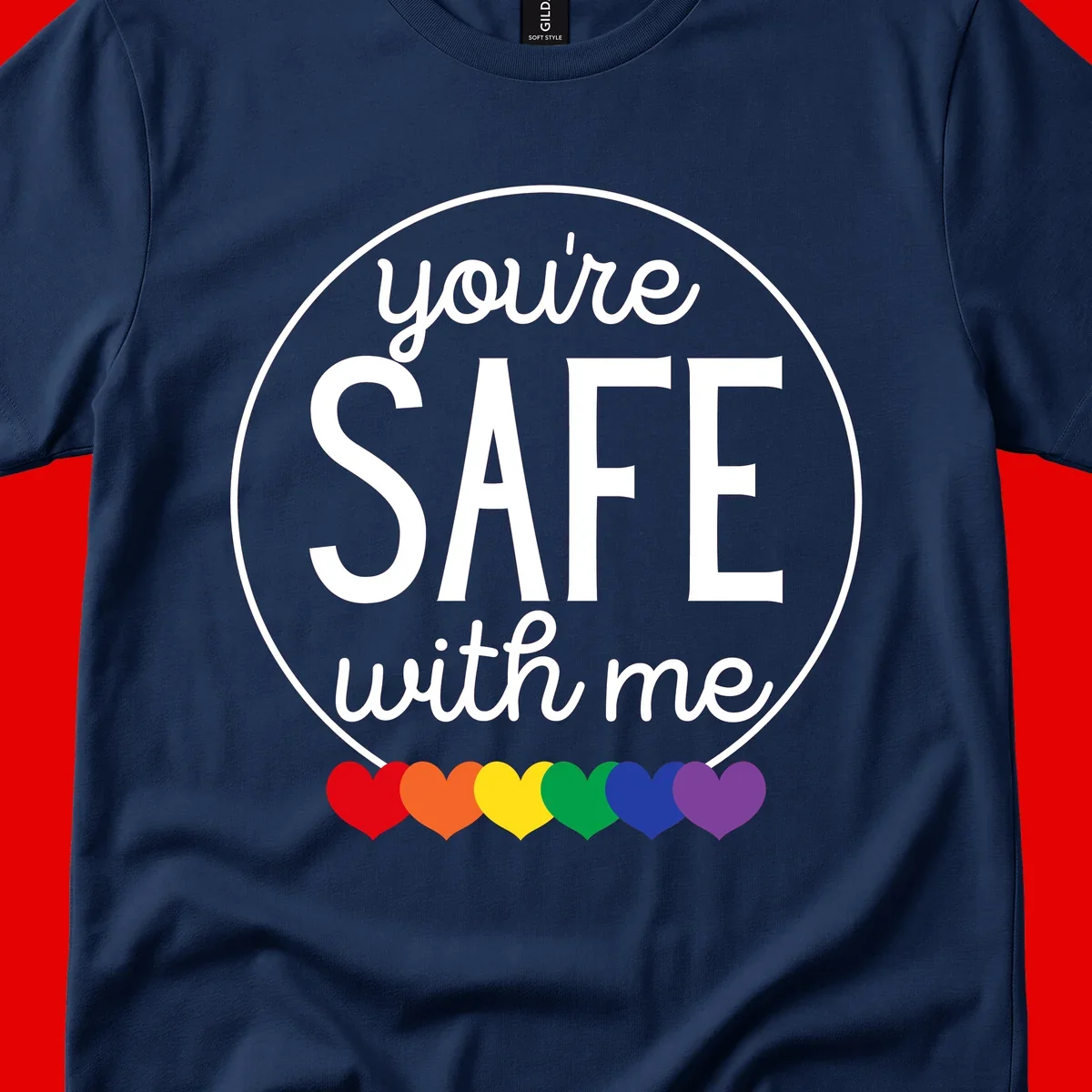 Circular badge with 'you're SAFE with me' text and rainbow pride hearts, promoting inclusive safe space message
