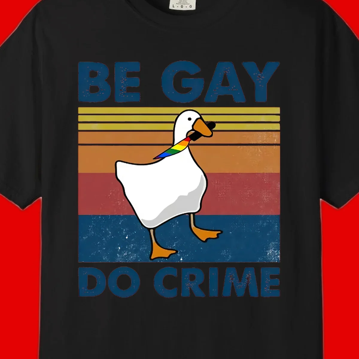 White duck with rainbow wing on retro striped background with 'Be Gay Do Crime' text, pride design