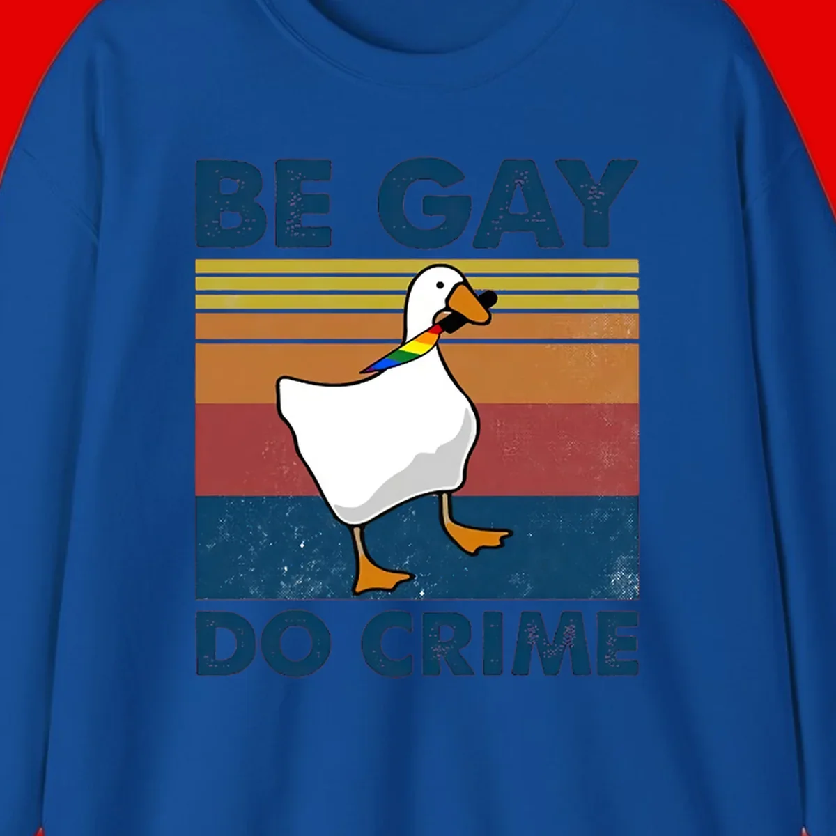 White duck with rainbow wing on retro striped background with 'Be Gay Do Crime' text, pride design