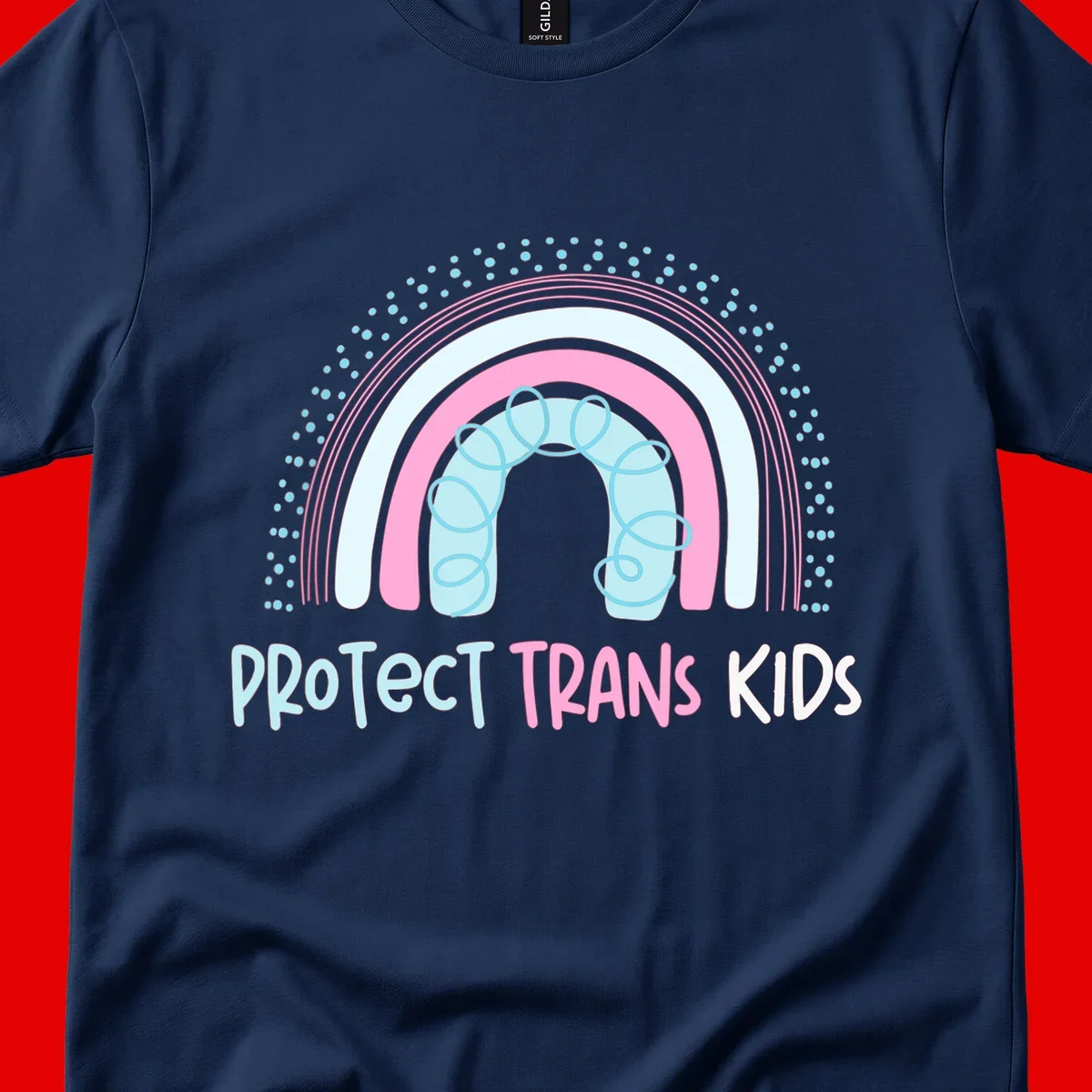 Protect trans kids pride design: rainbow arch with protective shield and DNA strands in pink, blue, and cyan with radiating dots