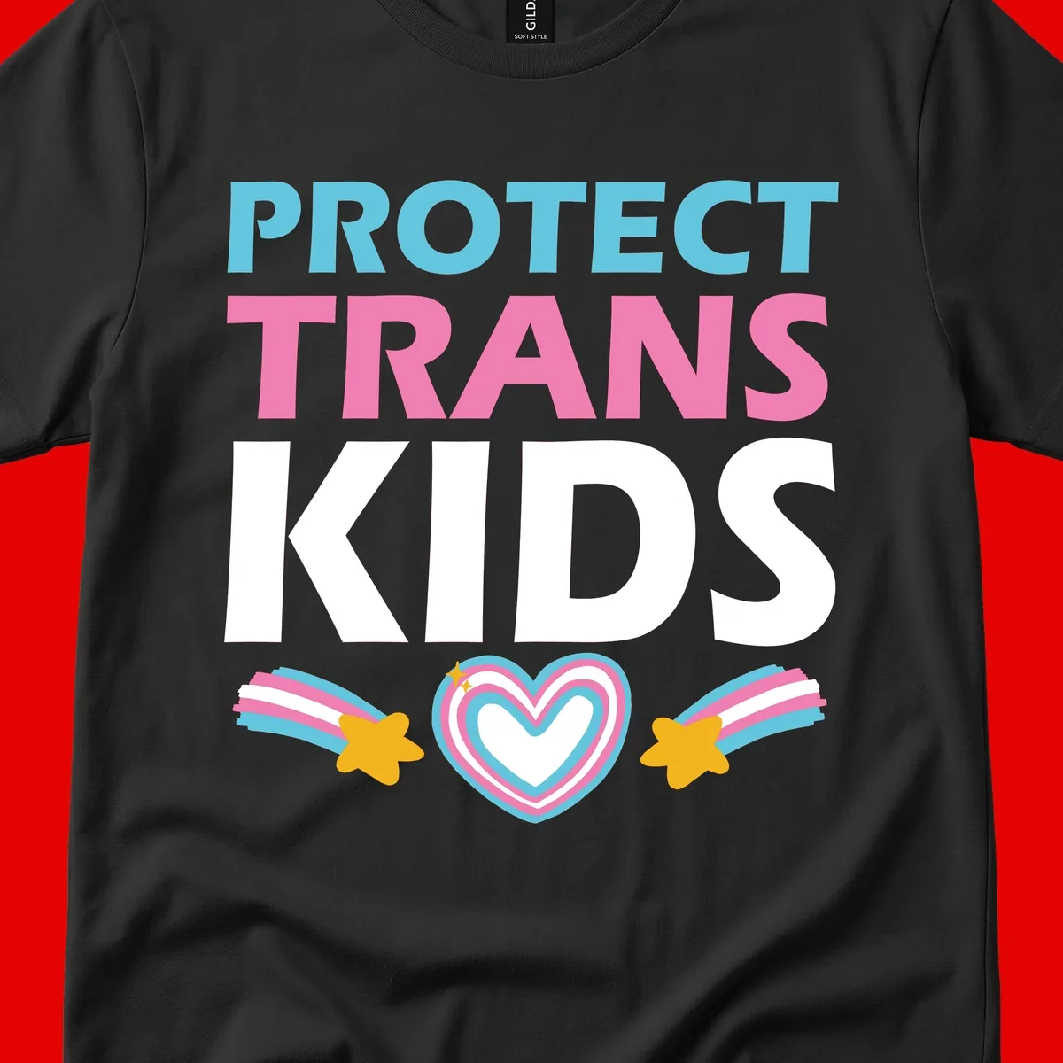 Protect trans kids pride design with cyan, pink and white text, concentric heart, and gold shooting stars with rainbow trails