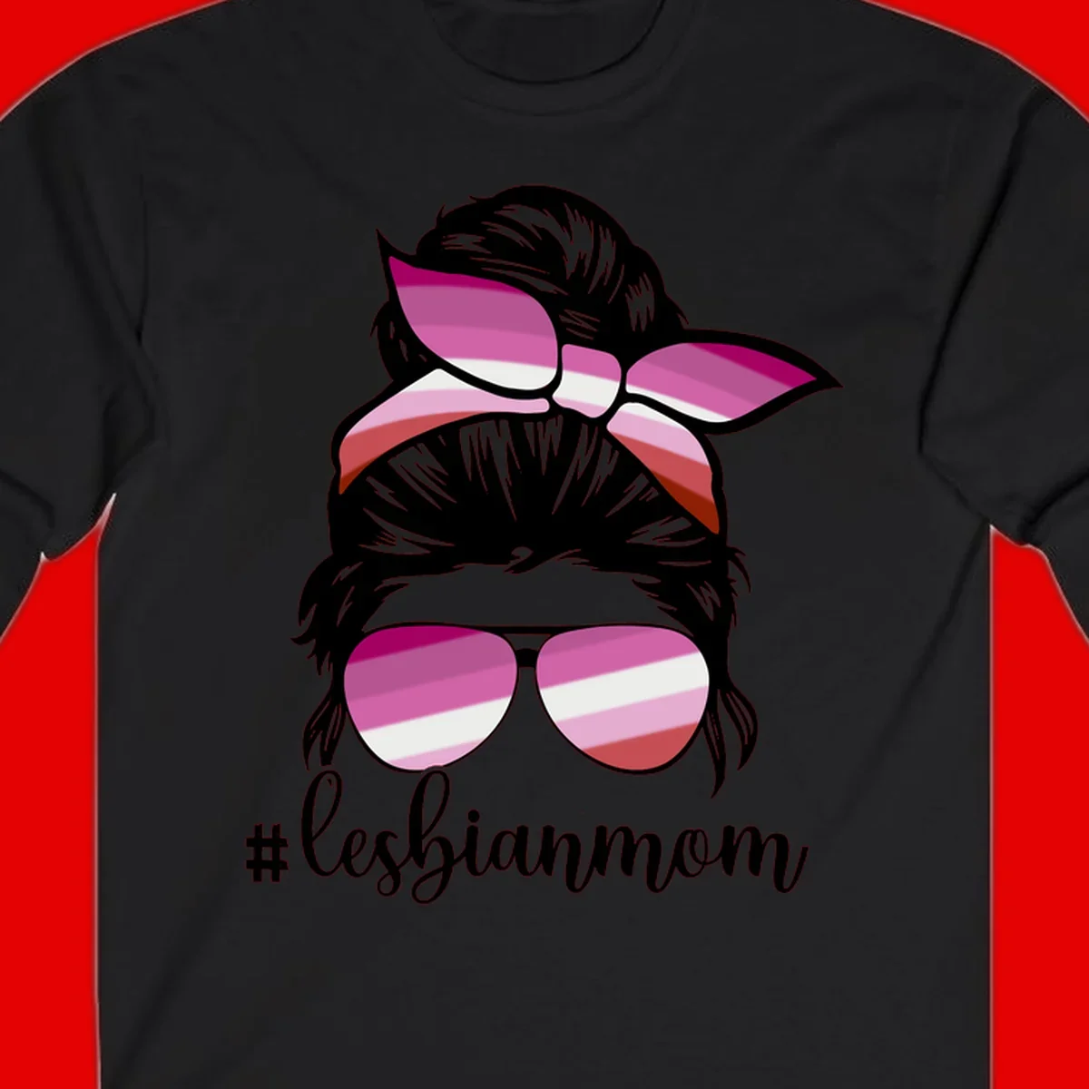 Illustration of a woman with black hair, pink bow, and aviator sunglasses featuring lesbian pride flag stripes with #lesbianmom text