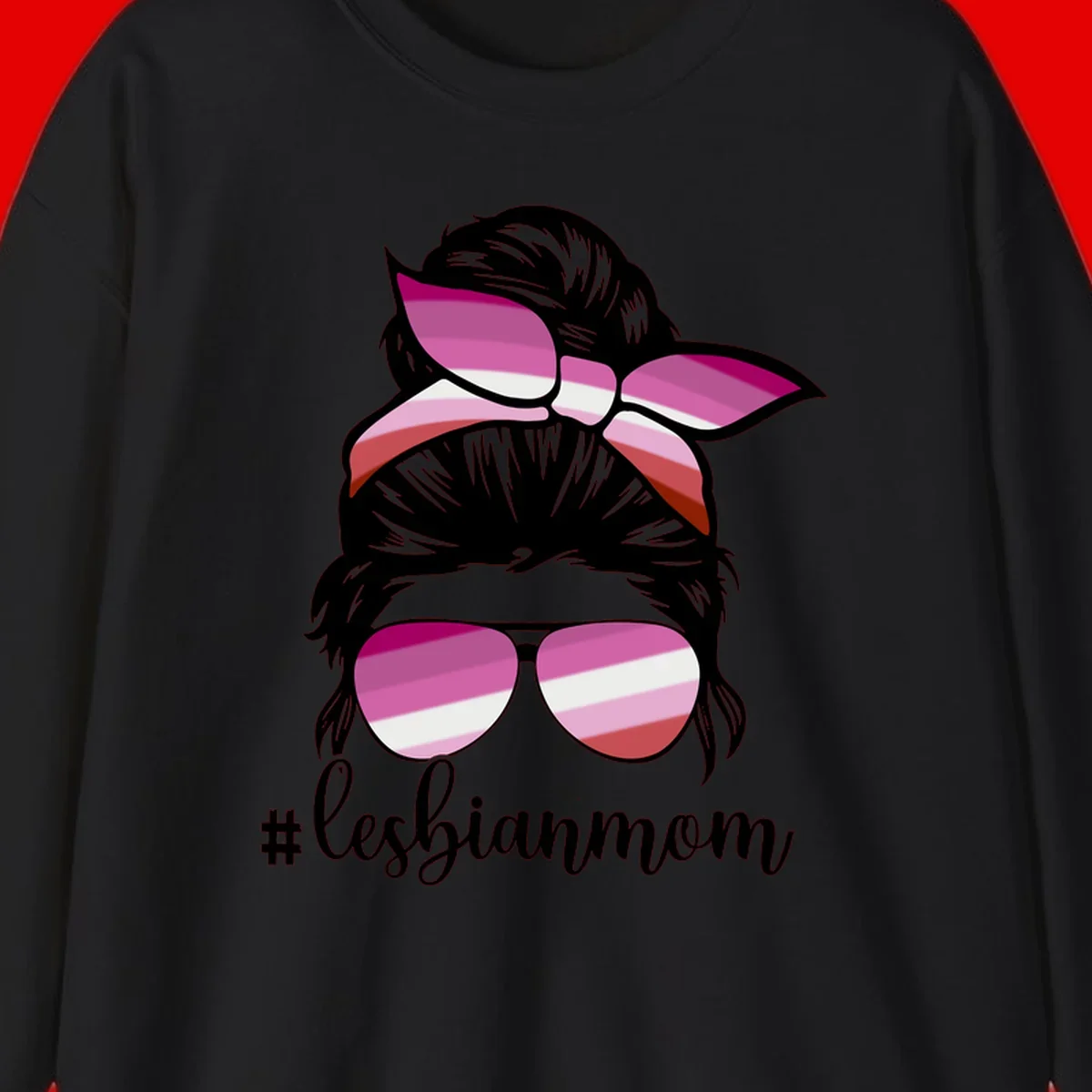 Illustration of a woman with black hair, pink bow, and aviator sunglasses featuring lesbian pride flag stripes with #lesbianmom text